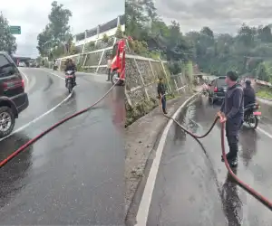 BPBD Bener Meriah Bersihkan Tumpahan Solar di Tengah Jalan