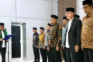 Pj Gubernur Kukuhkan Tim Pengawas Sistem Jaminan Produk Halal MPU